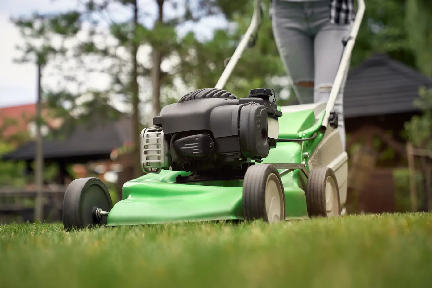 female-legs-woman-using-lawn-mower